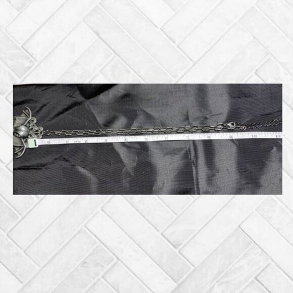 "Evil Bat" Bird Skeleton Head and Ruby-Colored Austrian Crystal Pendant - Picture 10 of 11